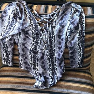 Snakeskin print body suit